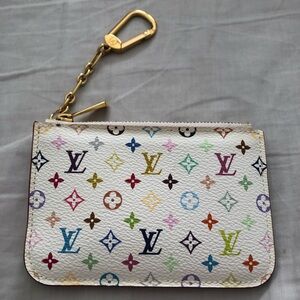 Authentic Louis Vuitton Pochette Cles in Litchi